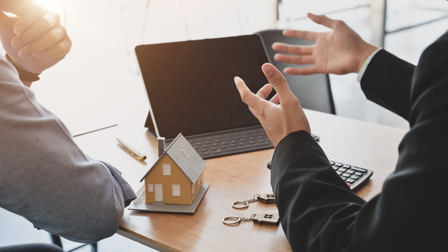 Business People Negotiating about  Real Estate 